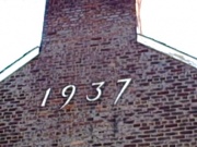 The date on the chimney of the Lorimer Rich field house, which still stands today. Photo credit: dg